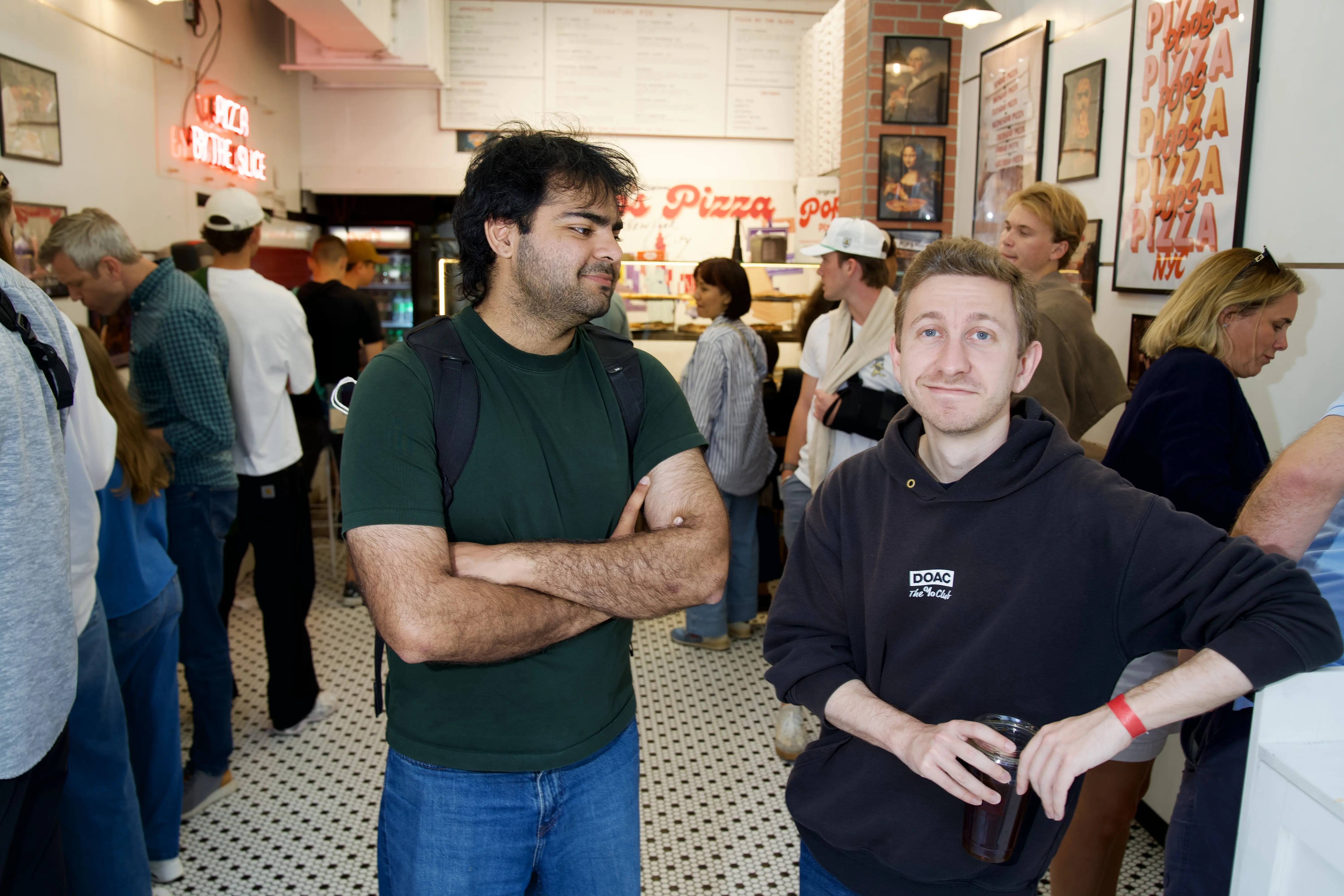 Rox and a friend at a pizza shop