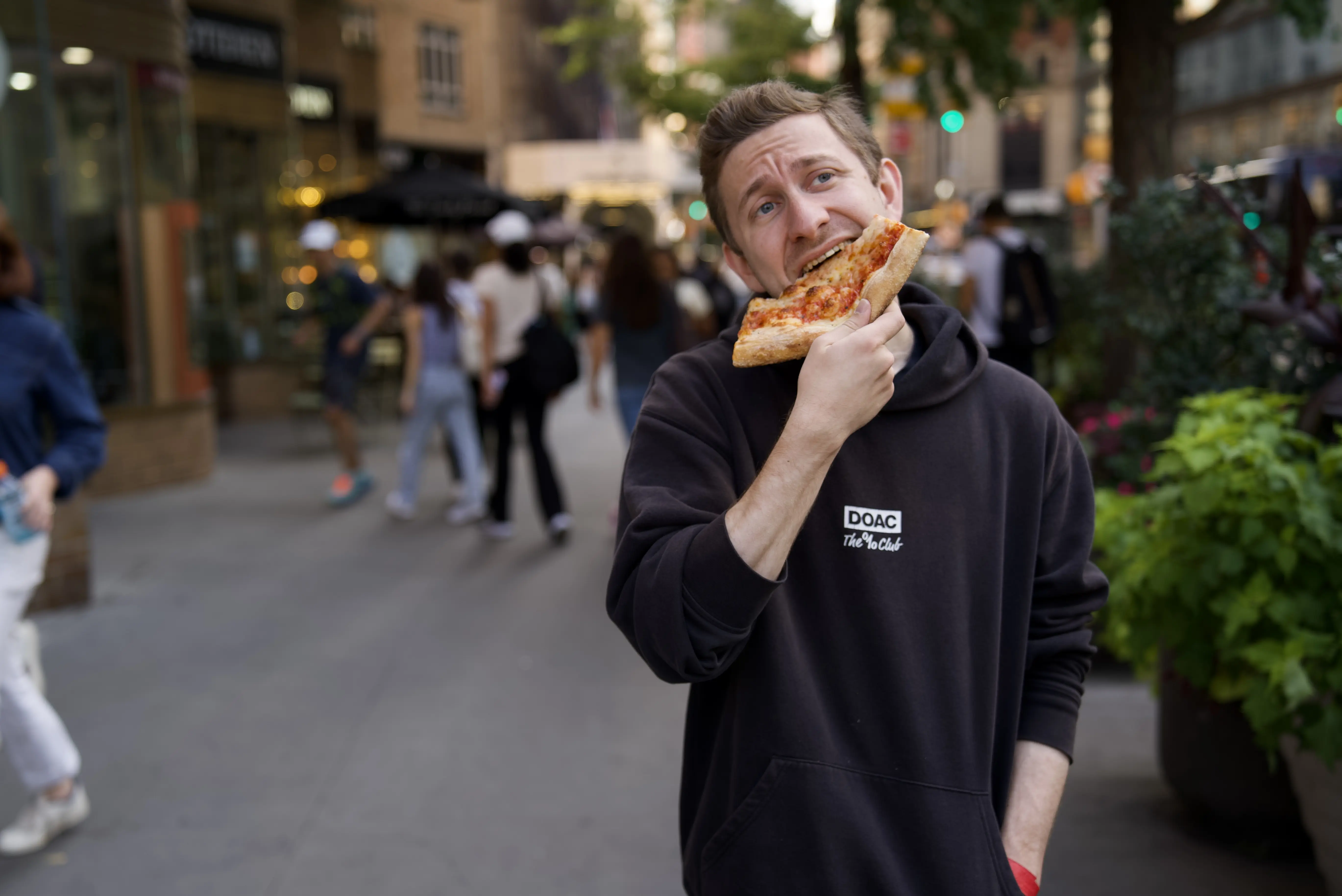 Rox eating pizza